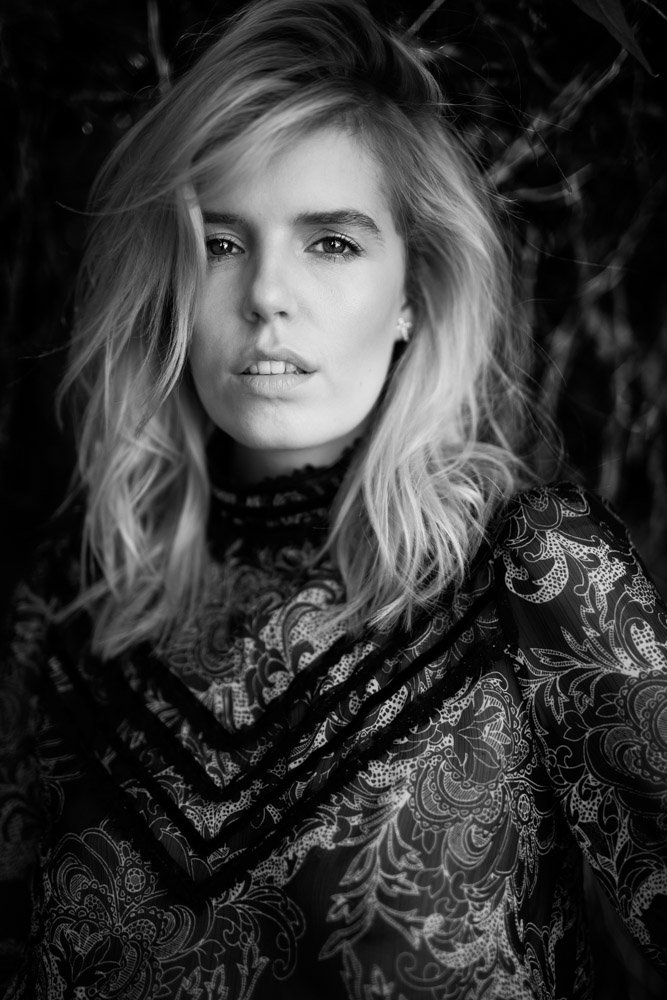 Black and white portrait of a blonde girl