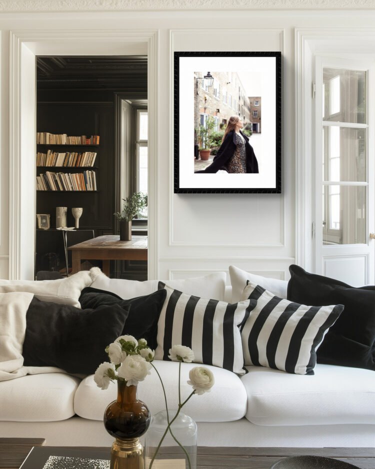 Fine art photograph of a woman dancing freely in a London mews, capturing an ethereal, joyful moment in the city.