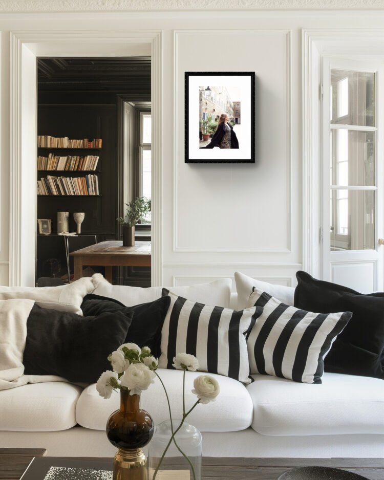 Fine art photograph of a woman dancing freely in a London mews, capturing an ethereal, joyful moment in the city.