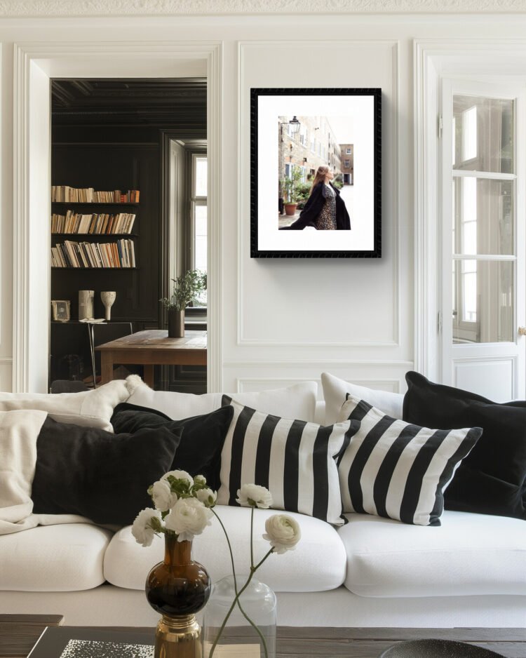 Fine art photograph of a woman dancing freely in a London mews, capturing an ethereal, joyful moment in the city.